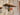 Industrial wall shelf with wood plank and brass pipe fitting, red valve accent, rustic decor