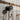 Industrial steampunk coat hook with valve detail on rustic wooden wall