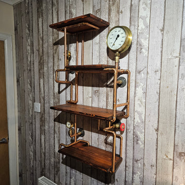 Steampunk industrial wall shelf with copper pipes, wood planks, and vintage gauges
