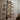 Industrial wall decor made from copper pipe with steampunk valve, rustic wood background