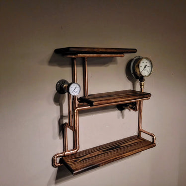 Steampunk industrial pipe wall shelf with wood planks and vintage pressure gauges