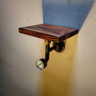 Handmade steampunk industrial wall shelf with wood top and vintage pipe gauge detail
