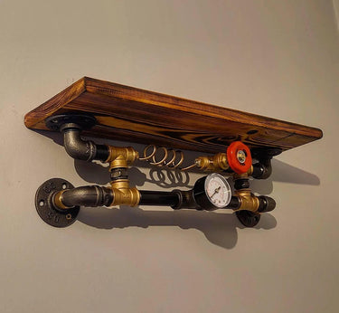 Steampunk industrial wall shelf with wood, metal pipes, gauge, and red valve