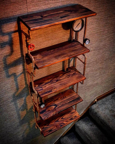 Steampunk industrial shelving unit with dark wood shelves, copper pipes, and pressure gauge accents