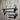 Steampunk industrial pipe wall shelf with pressure gauges and hooks on rustic wood panel