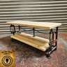 Handmade steampunk industrial table with wood shelves, black pipe frame, and metal chain accents
