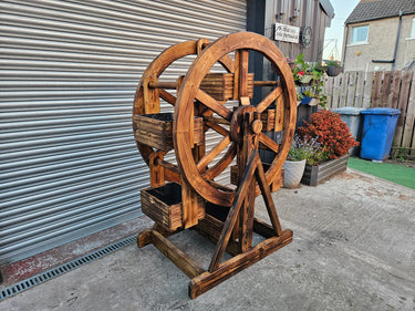 Handmade rustic wooden Ferris wheel planter with industrial style for garden decor