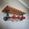 Steampunk industrial wall shelf with wood top and red valve handles for home decor