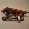 Steampunk industrial wall shelf with wood, metal pipes, gauge, and red valve