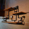 Steampunk industrial wall shelf with wood planks, metal pipes, and vintage gauges