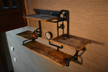 Steampunk industrial shelving unit with dark wood shelves, metal pipes, and vintage gauges.