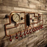 Steampunk coat rack made from copper pipes, pressure gauges, and red hooks mounted on wood wall.